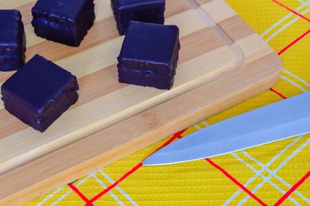Austrian honey cakes on a wooden Board and yellow textilesの写真素材