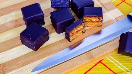 Austrian honey cakes on a wooden Board and yellow textilesの写真素材