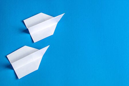 paper airplane-a symbol of easy but short-lived flightの写真素材