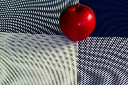 apples on a background divided into four parts