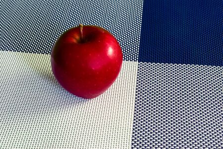 apple on a background divided into four partsの写真素材