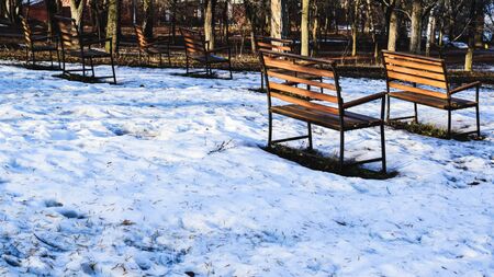 the beginning of spring in the Park, the snow began to melt and thawedの写真素材