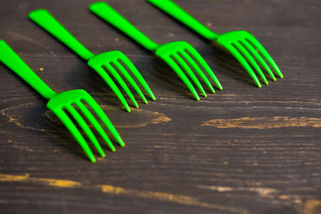 scrambled eggs made of plasticine and plastic Cutlery of different colorsの写真素材