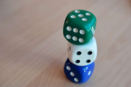 dice of different colors in different combinationsの写真素材