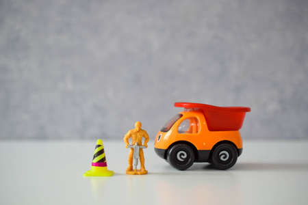 road worker or worker with a jackhammer in various situations on the road, dollsの写真素材