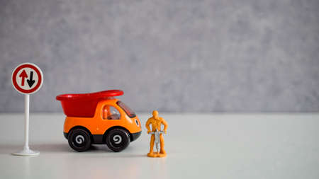 road worker or worker with a jackhammer in various situations on the road, dollsの写真素材