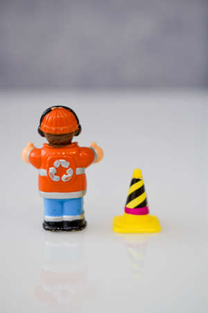 road worker or worker with a jackhammer in various situations on the road, dolls