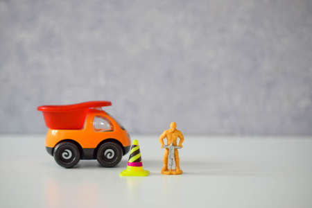 road worker or worker with a jackhammer in various situations on the road, dollsの写真素材
