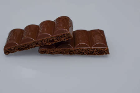 porous chocolate, white and milkの写真素材