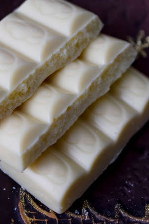 porous chocolate, white and milkの写真素材