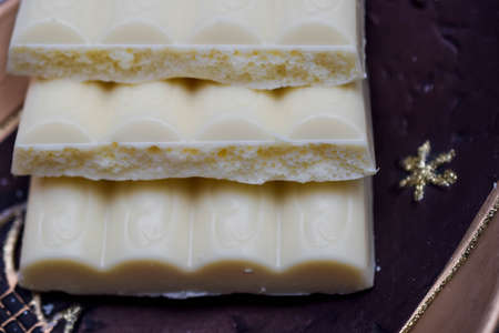 porous chocolate, white and milkの写真素材