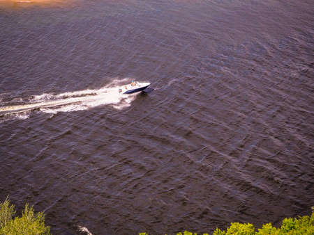 landscape, view of the river, Volga, boats go on the river and people do water sports