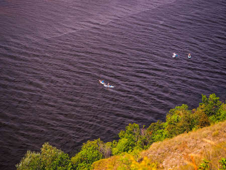 landscape, view of the river, Volga, boats go on the river and people do water sportsの写真素材