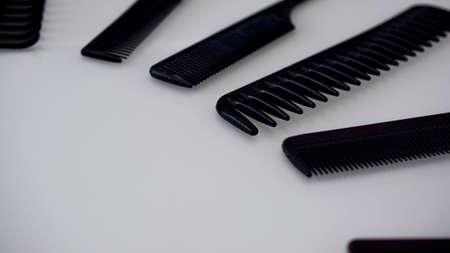 combs of different shapes and purposes, for hairdressers