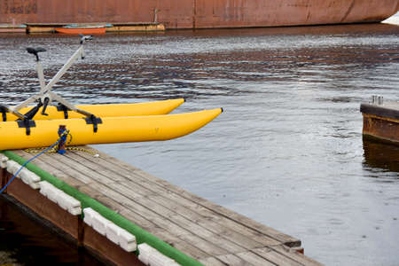 boat on the water at the pier in spring on a clear dayの写真素材