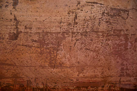 flat surface painted unevenly with warm colorsの写真素材