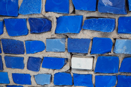 Blue and white mosaic on the wall. Abstract background and texture.の写真素材