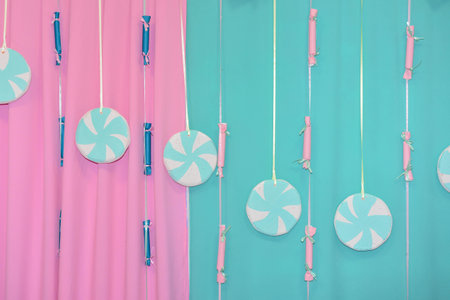 Lollipops on a pink and blue background. Summer concept.の写真素材