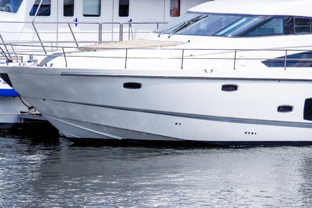 White yachts moored in a yacht marina close-upの写真素材