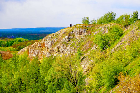 Landscape with green trees and rocks. View from the hill.の写真素材