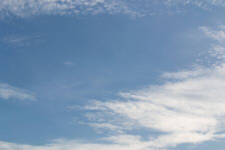 blue sky background with tiny cloudsの写真素材