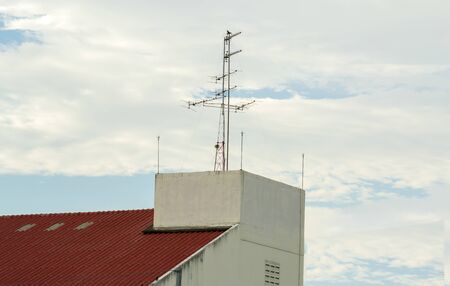 on a roof of a building , TV antennaの写真素材