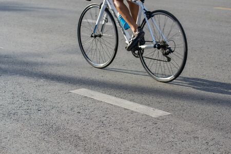 Cycling on the road in thailandの写真素材