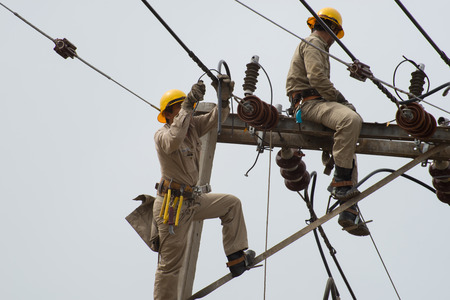 Electrician connects a Power meter.の写真素材