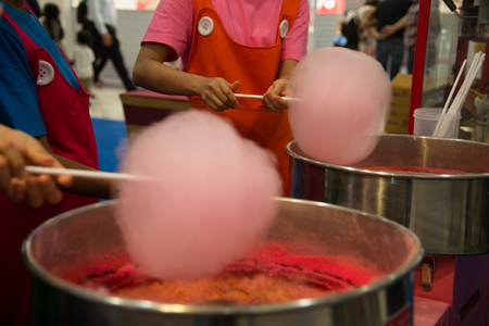 People are making cotton candyの写真素材