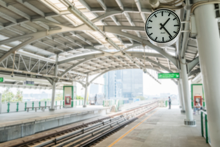 Clock on train station/effect blur background