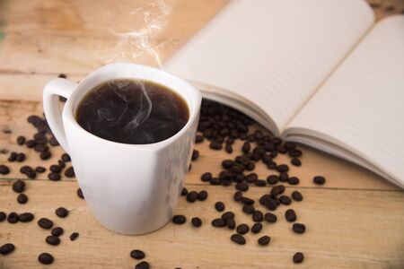 Cup of coffee on a wooden table.の写真素材