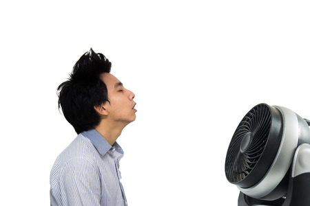 Men feel relief from the hot weather.の写真素材