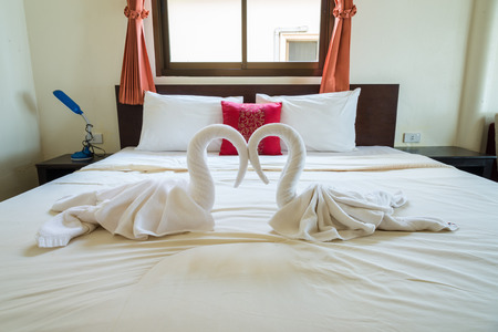 Tropical bedroom interior with double bed and seascape view.の写真素材