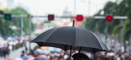 The people sitting in the Sun parasol is hot.の写真素材