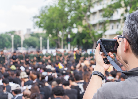 The Hand holding the camera..のeditorial素材