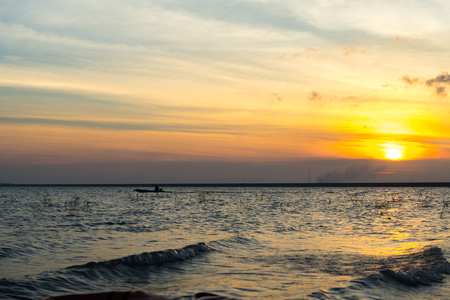 Silhouette of Canoes on the Riverの写真素材