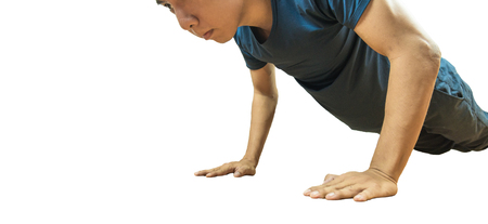 Young man doing push up exerciseの写真素材
