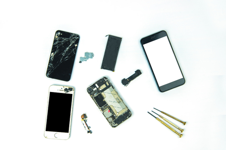 smartphone with cracked screen, isolated on white background.の写真素材