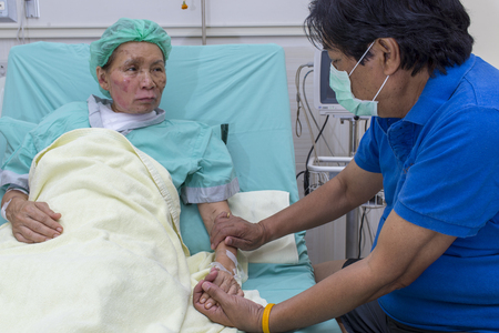 Nursing care and treatment for patient at burn unit in hospital.の写真素材