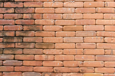 Brown Brick Mortar Wall With Broken Shabby Stucco Texture.の写真素材