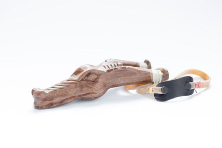 Wooden catapult on a white background