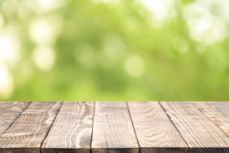 Wood table top on blurred background,used for display productsの写真素材
