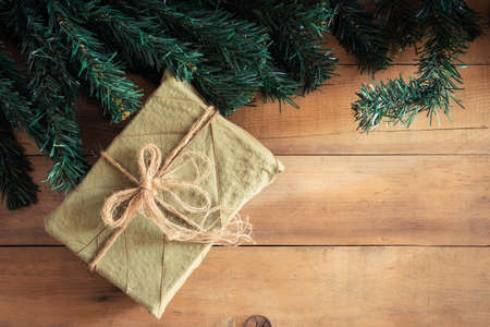 Gift box on old wooden background,Christmas concept