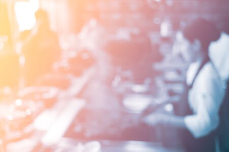 Blurry background  gradient style of Chef in hotel or restaurant kitchen cooking for partyの写真素材