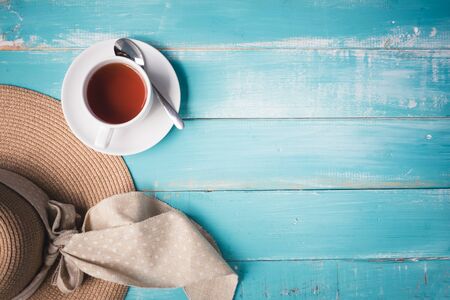 A cup of tea on a wooden table,top view copyspace conceptの写真素材