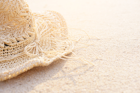 Background of Sand beach with accessories straw hat in summer time. Can add text to the left.の写真素材
