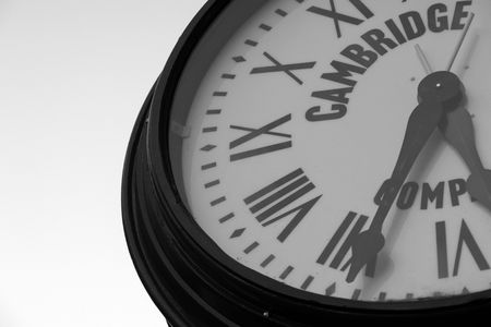 portion of public clock face in harvard square. the time is five thirty four PMの写真素材