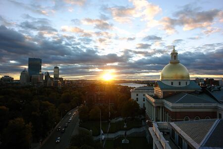  Showing Beacon street and the Massachusetts State Houseat sunsetの写真素材