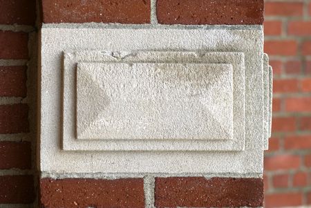 Cement detail of brick wall outside of building, rectangles of various sizesの写真素材
