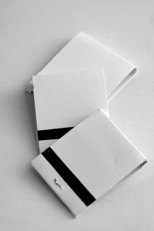 three blank whie match books on white background, ready to ad your textの写真素材